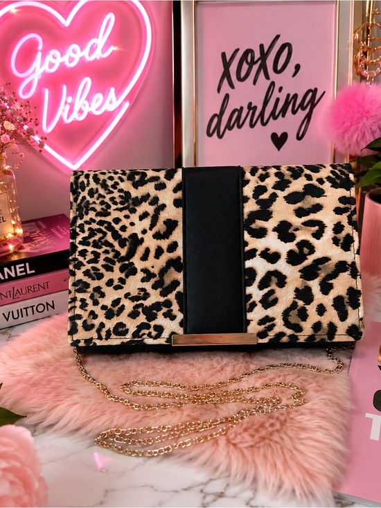 Source Unknown Handbags - Leopard print crossbody clutch with gold chain strap. NWOT